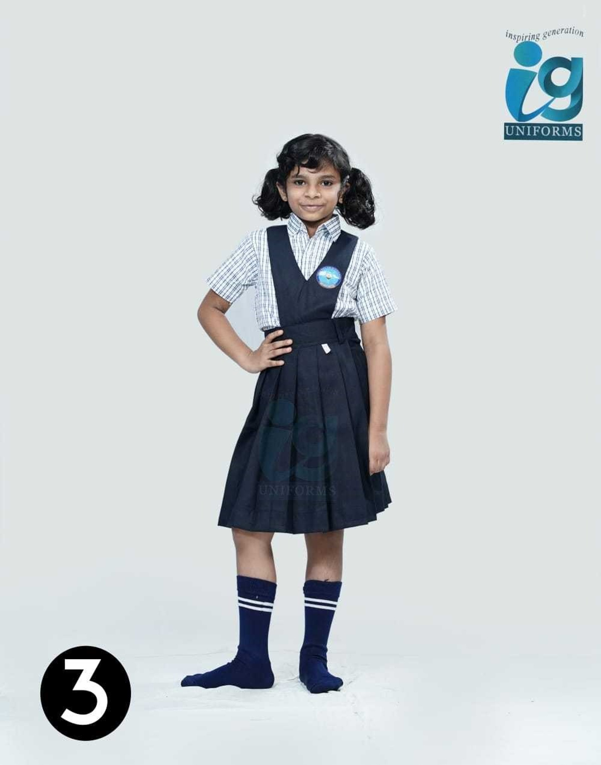 Student wearing an IG Uniforms school pinafore uniform
